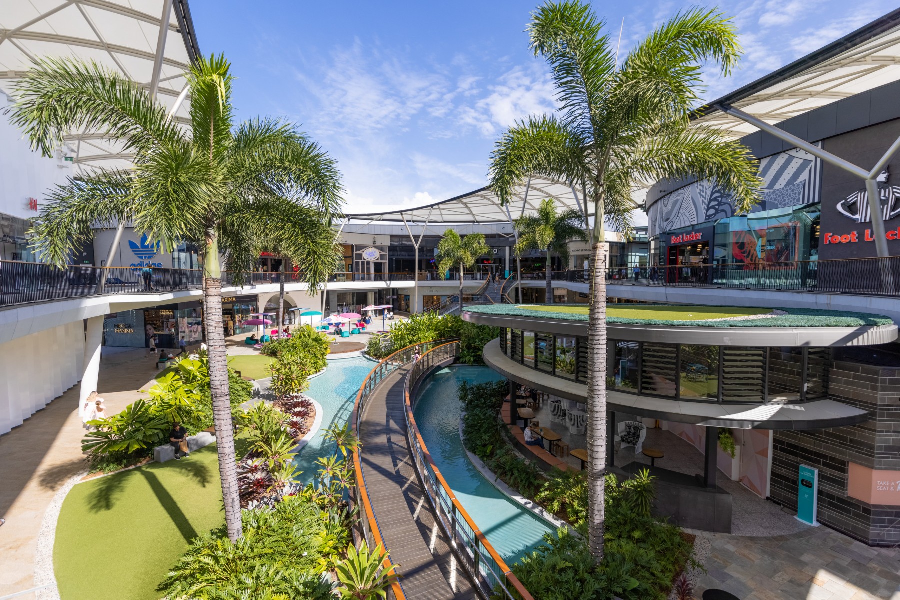 Louis Vuitton has opened an - Pacific Fair Shopping Centre